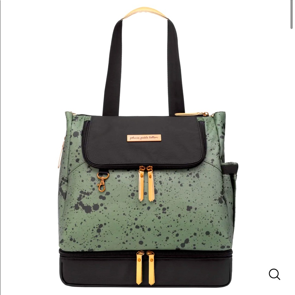 Sold.   Pivot Diaper Bag Petunia Pickle Bottom, includes 4 packing cubes